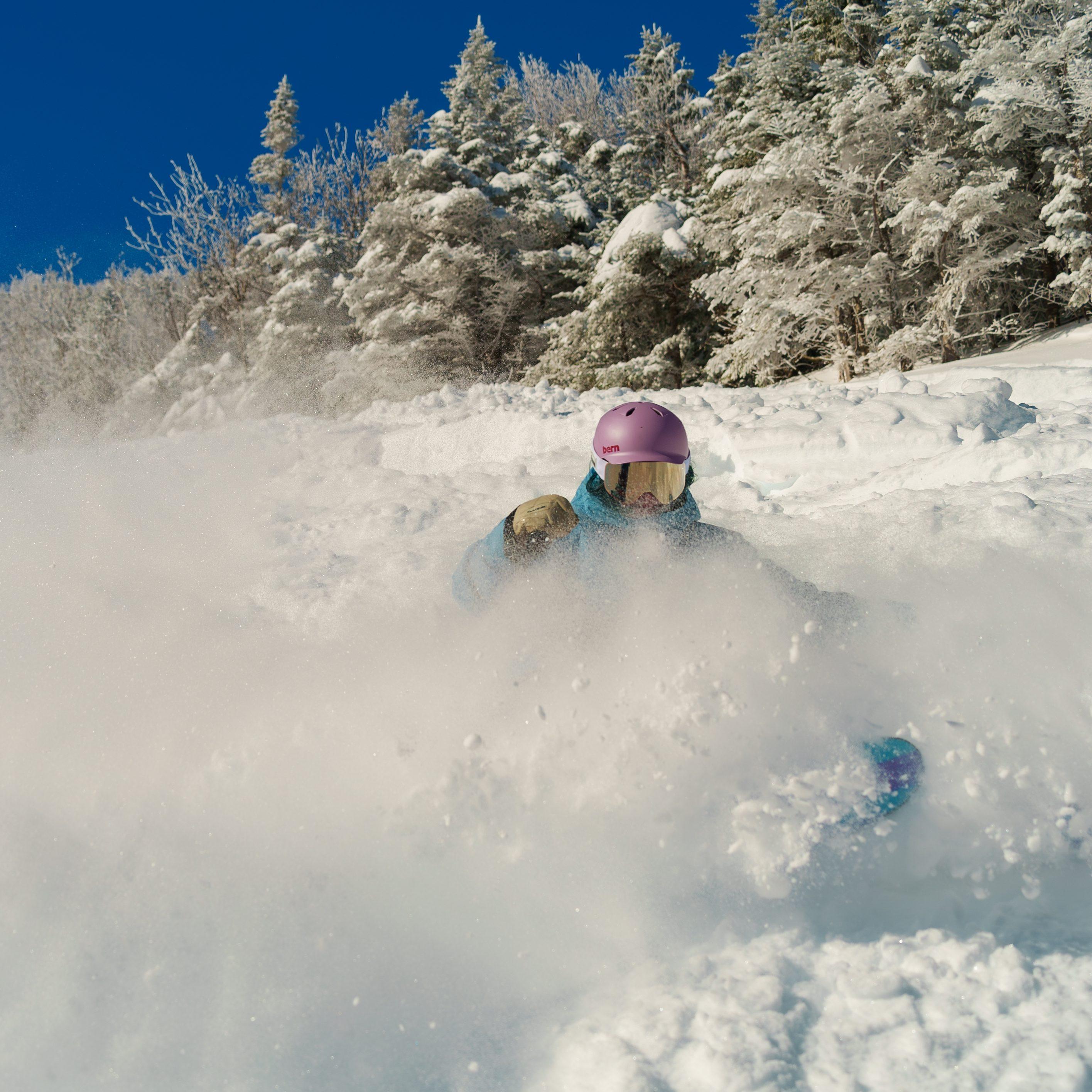 Powder shot purple helmet skier