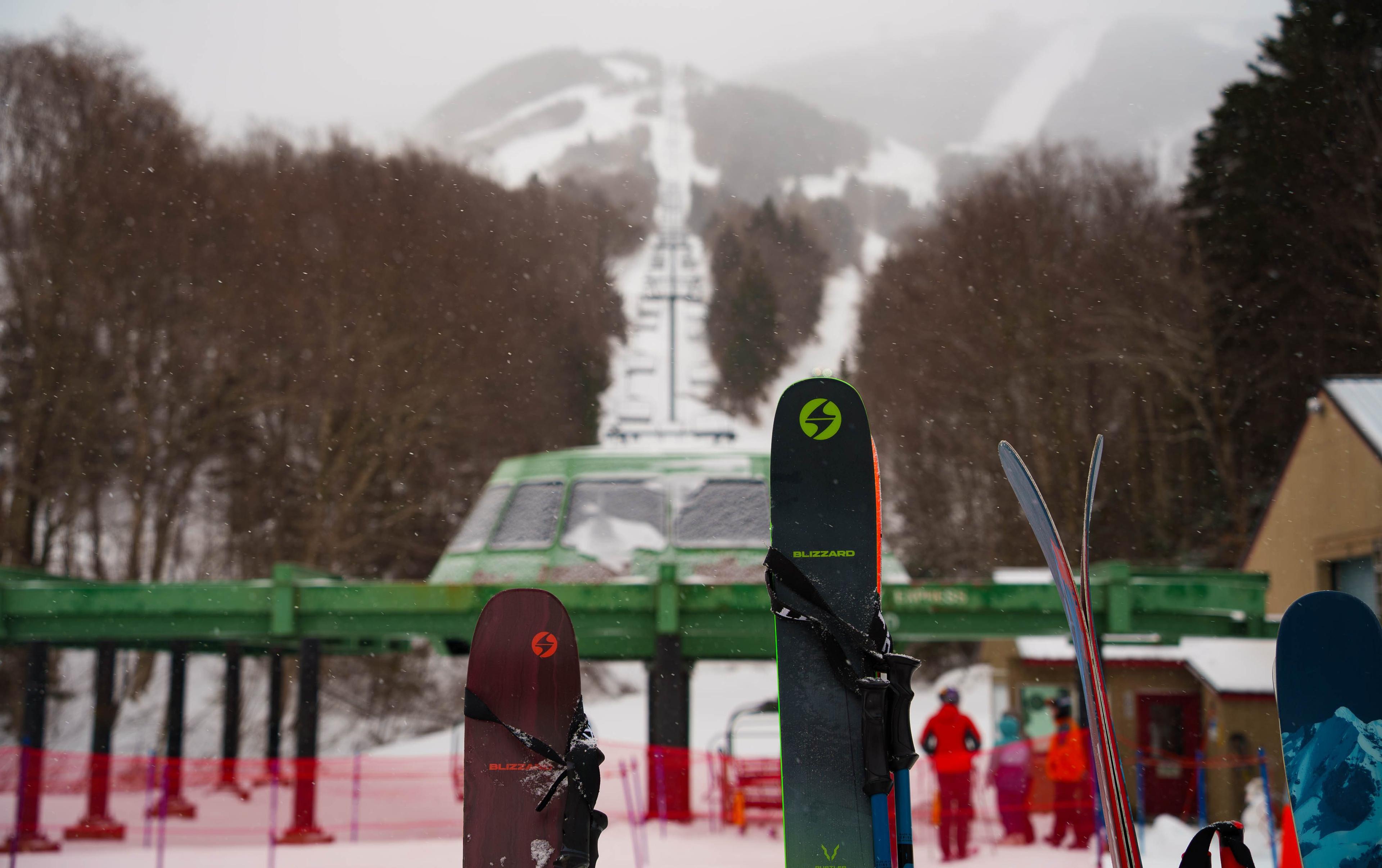 Blizzard skis in front of lift