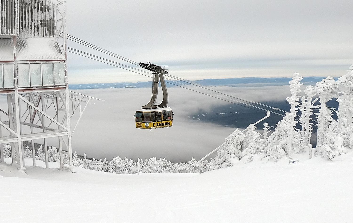 Yellow tram above the undercast